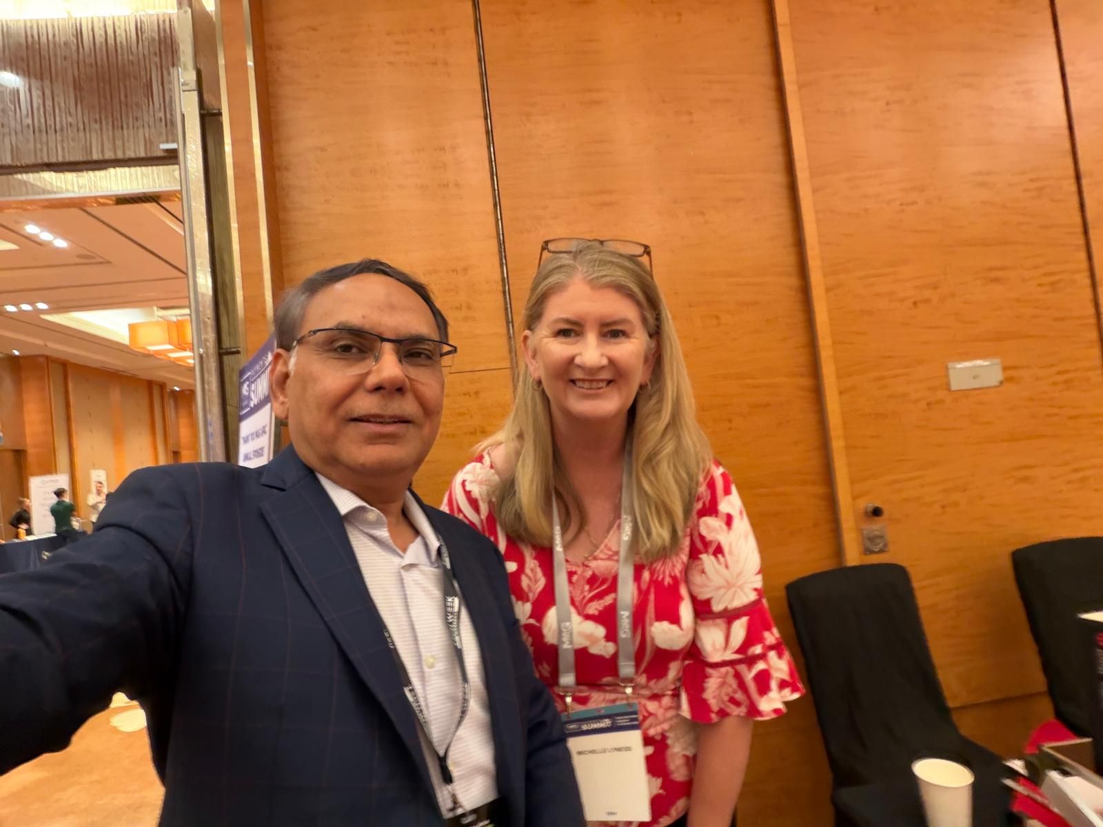 Dr Aftab Rizvi with a industry person at Tech week Singapore